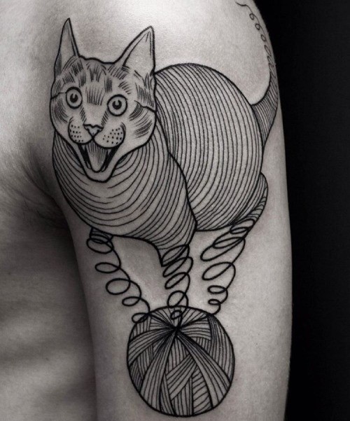 Surrealism linework style shoulder tattoo of cat with threads