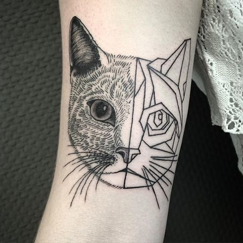 Surrealism style black ink biceps tattoo of cool cat face