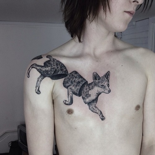 Surrealism style black ink chest and shoulder tattoo of running fox