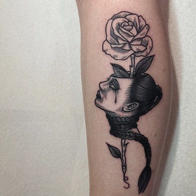 Surrealism style black ink colored leg tattoo of woman head with rose ...