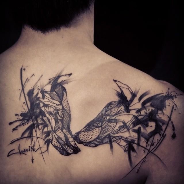 Surrealism style black ink scapular tattoo of wolf couple