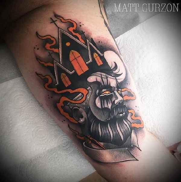Surrealism style colored biceps tattoo of demonic man with burning church