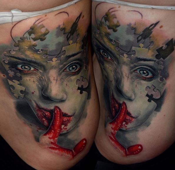 Surrealism style colored tattoo of puzzle woman with bloody hands