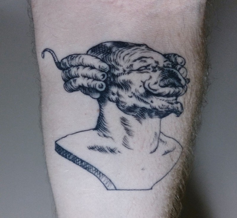 Surrealism style detailed arm tattoo of funny looking human statue