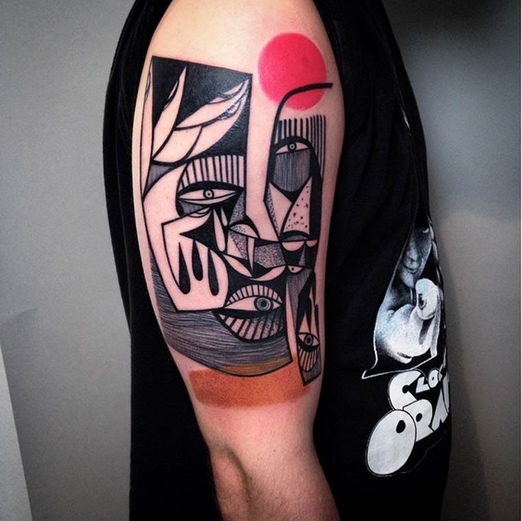 Surrealism style detailed shoulder tattoo of human face with red circle