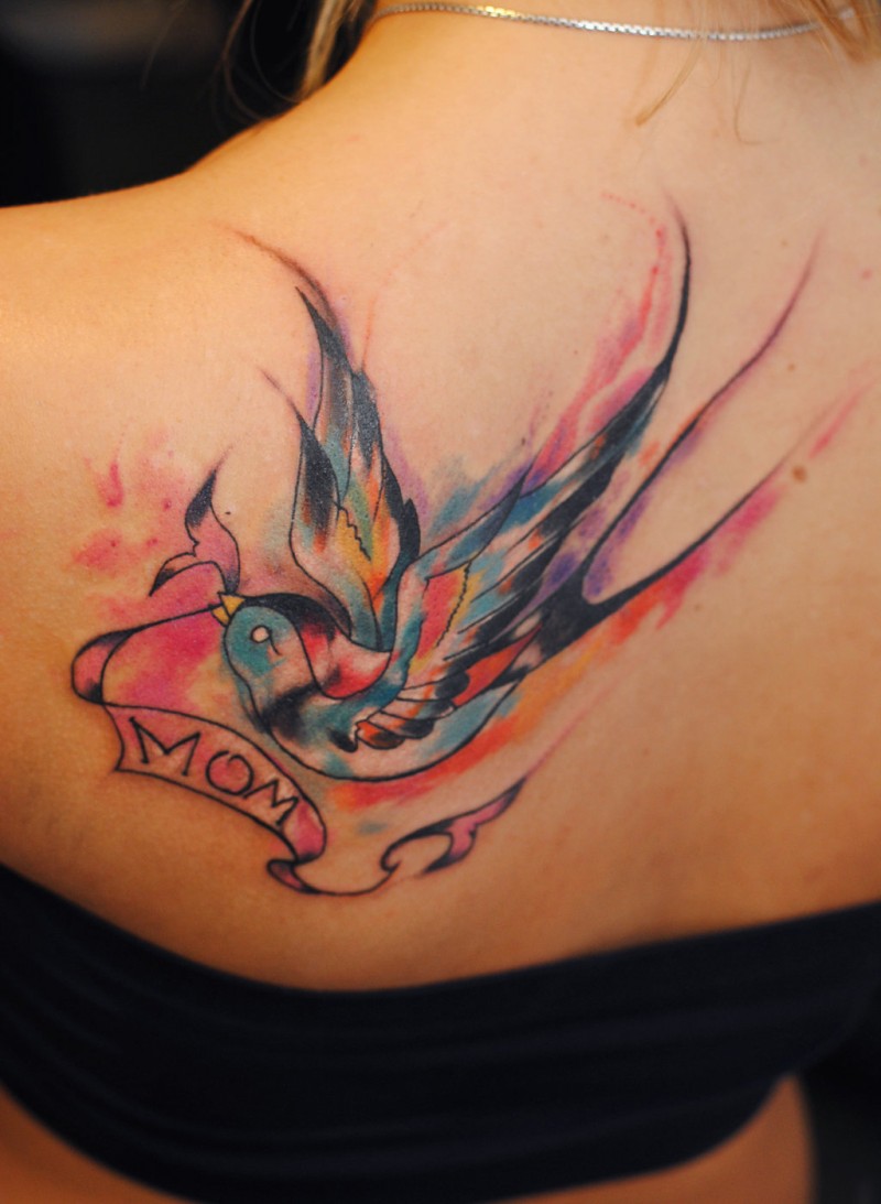 Swallow watercolor tattoo by dope indulgence