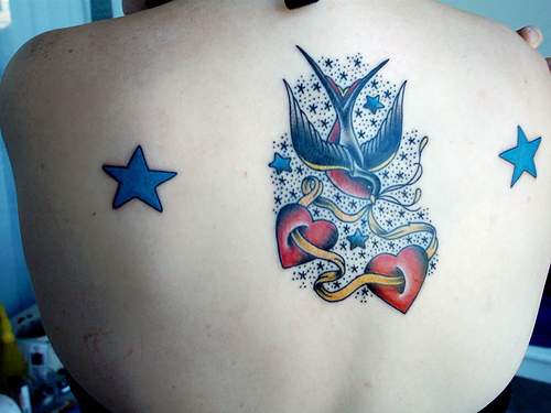 Swallow with heart and Stars tattoo