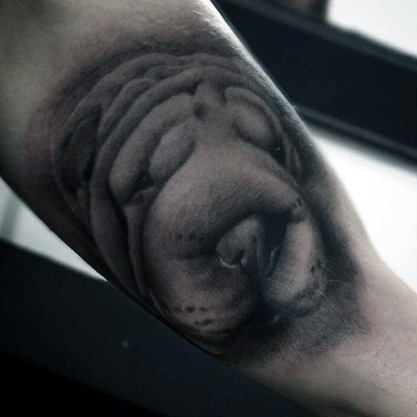 Sweet and cute little dog portrait tattoo on arm