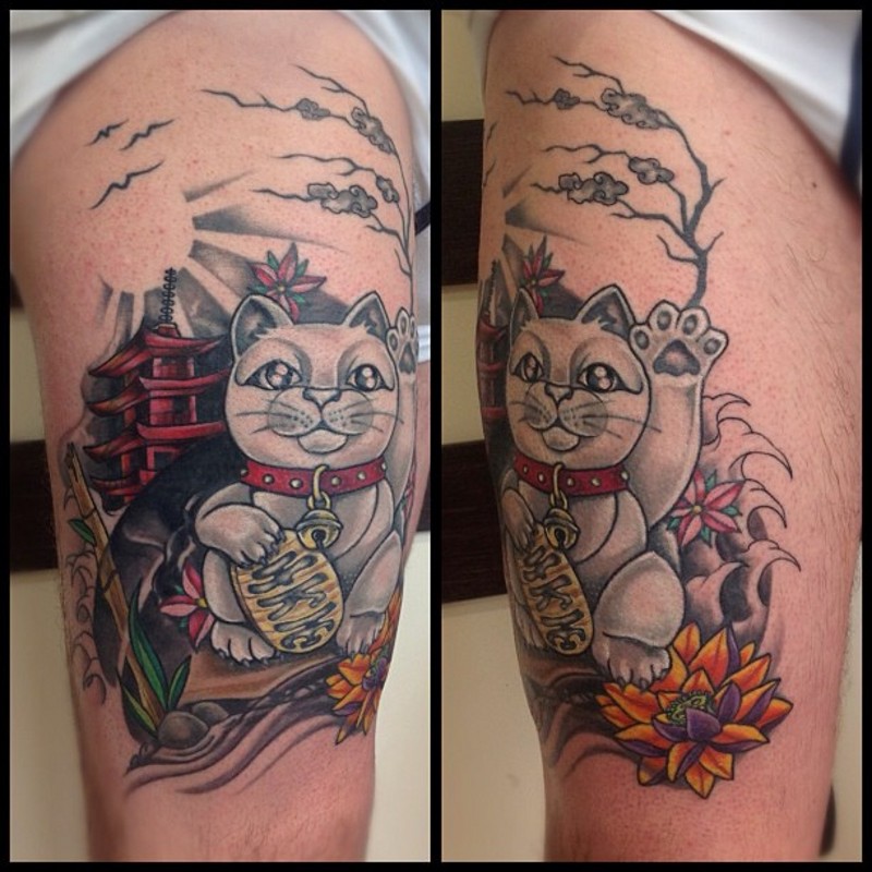 Sweet cartoon style colored thigh tattoo of Asian cat with flower and lettering