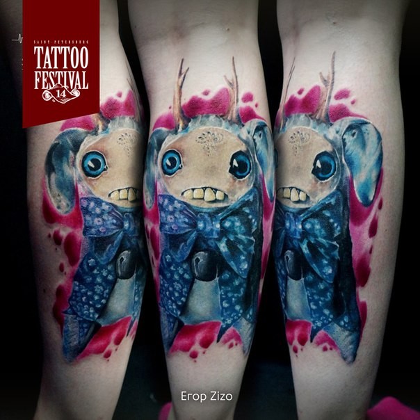 Sweet looking colored leg tattoo of funny monster with horns