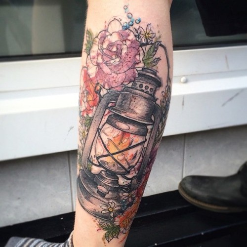 Sweet looking colored leg tattoo of old gas lighter with flowers