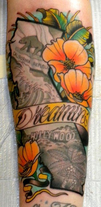Sweet memorial style multicolored floral tattoo with animals and lettering on arm
