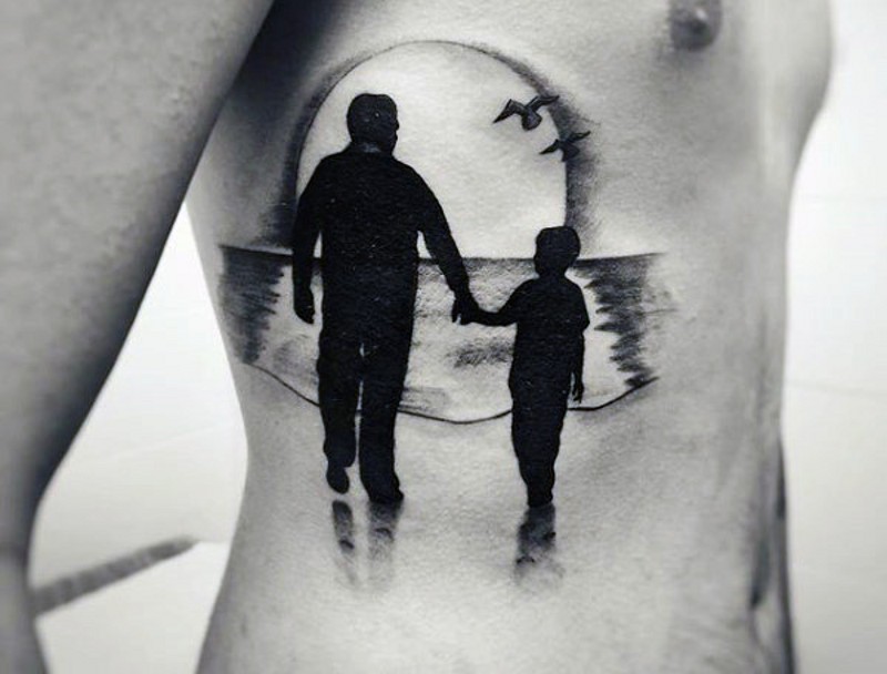 Sweet painted black ink father and son with sunset tattoo on side
