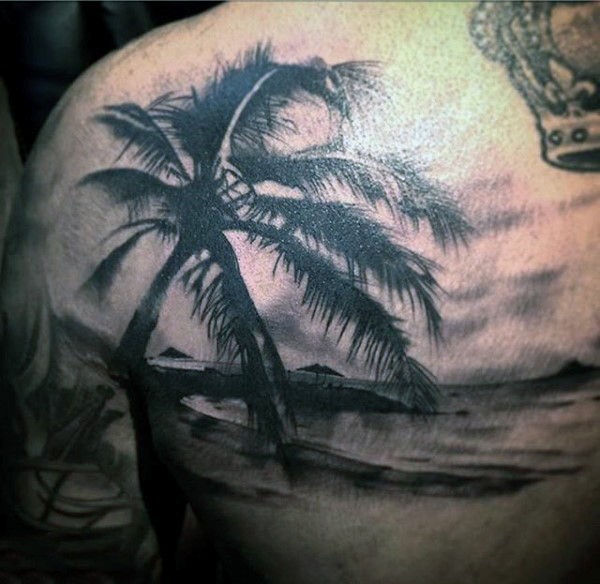 Sweet painted black ink island ocean shore tattoo with palm tree on shoulder