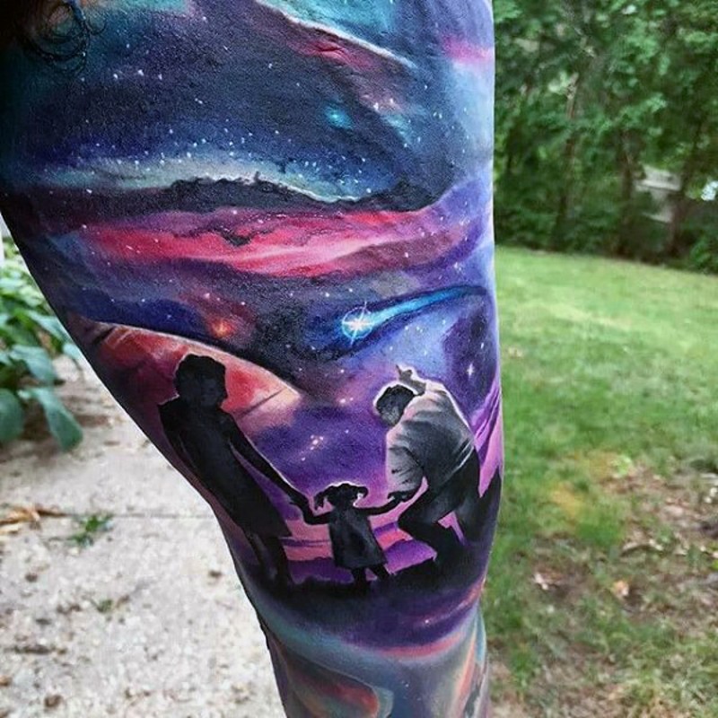 Sweet painted colored big night sky with family tattoo on thigh