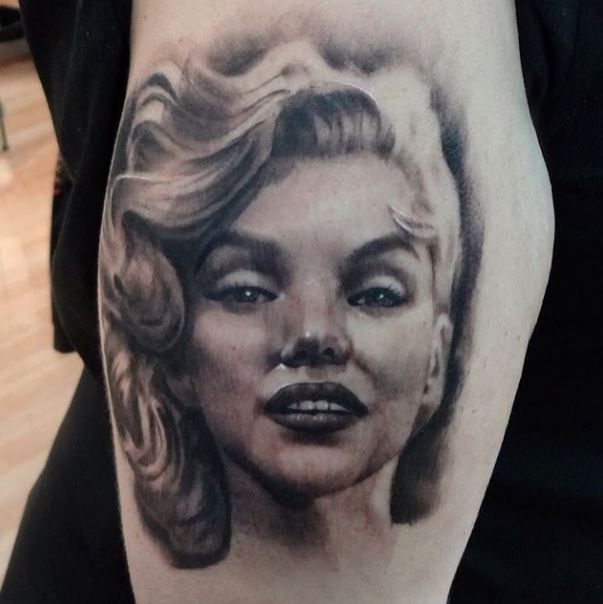 Sweet seductive realistic lifelike Marilyn Monroe&quots portrait tattoo on lady" s shoulder