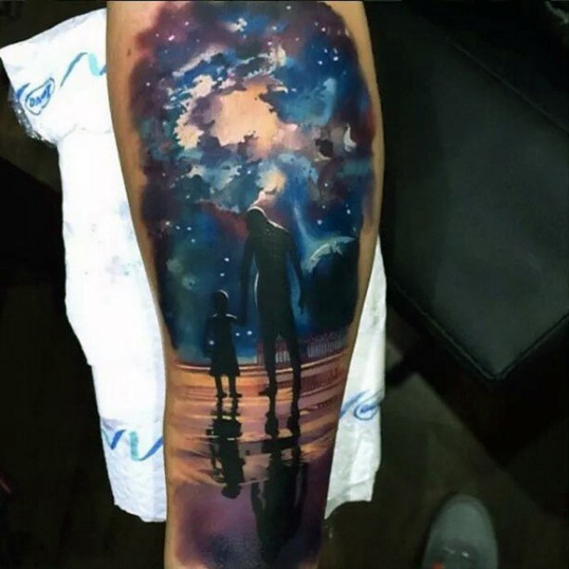 Sweet themed colored father and son under night sky tattoo on arm