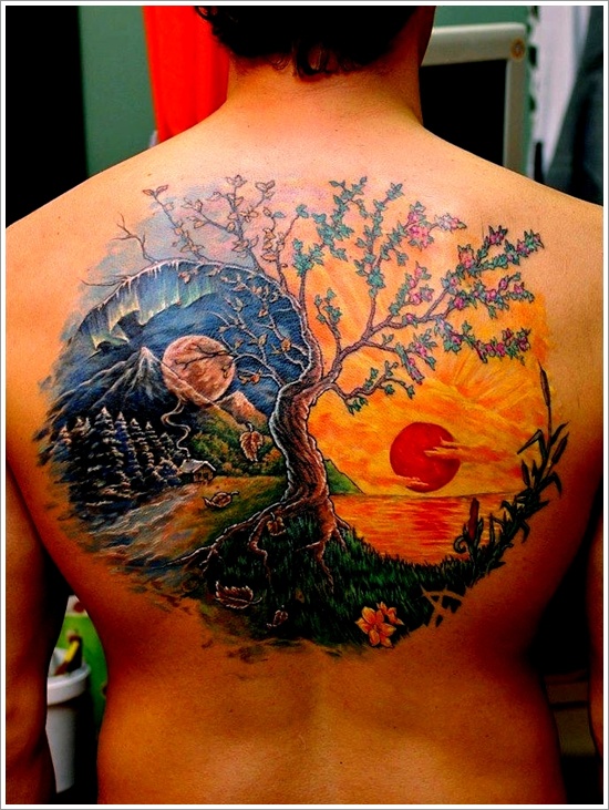 Tatuaggio grande sulla schiena il paesaggio colorato in stile Yin-Yang