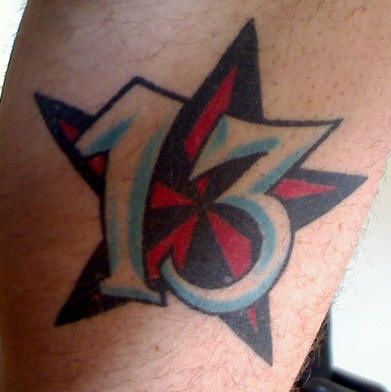 Nautical star and lucky number tattoo