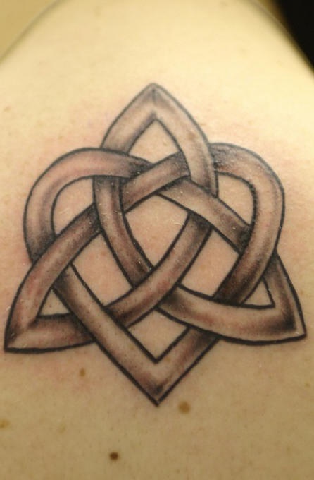 Celtic tracery tattoo on shoulder