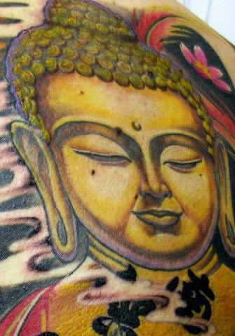 Buddha della Pace dorato
tatuaggio