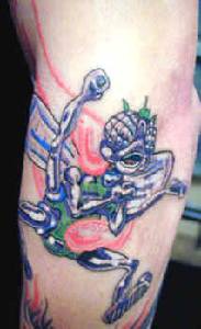 alieno caratista tatuaggio colorato