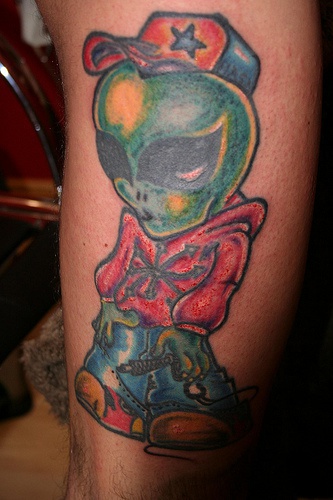 Super cool alien in hat tattoo