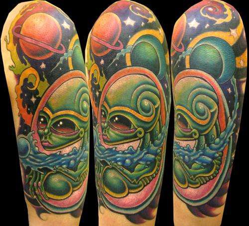 Alien world coloured tattoo