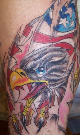 American flag and eagle under skin rip tattoo