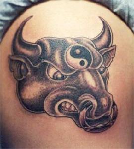 Angry bull with yin yang symbol