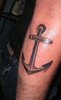 Great steel anchor fresh tattoo on foot