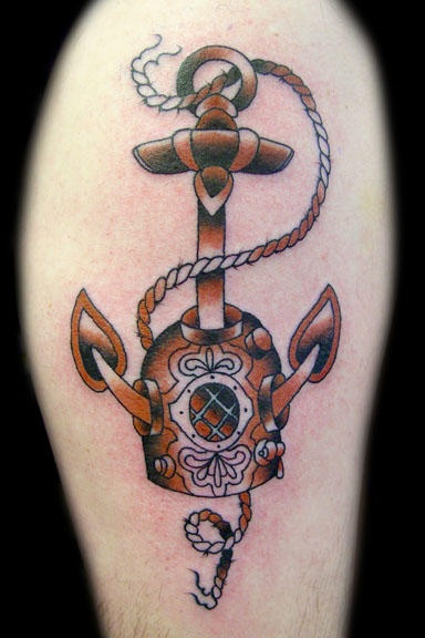Old diving helmet and anchor tattoo in colour