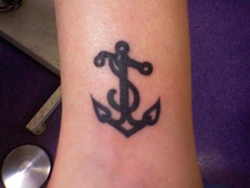Usual black anchor tattoo