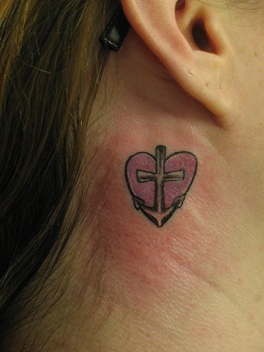 Little anchor in heart tattoo behind ear