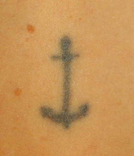 Primitive black anchor tattoo