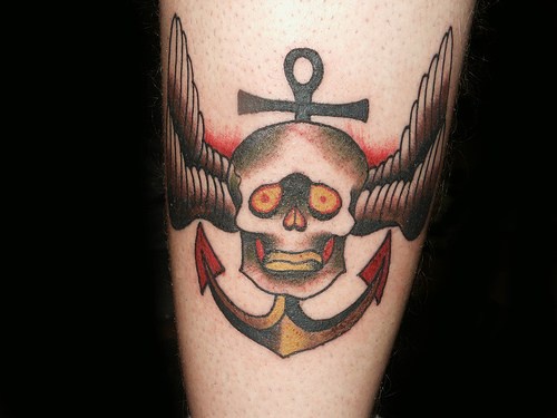 Fearful skull flying on wings with anchor background