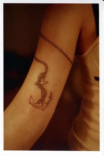 Anchor with rope around hand tattoo