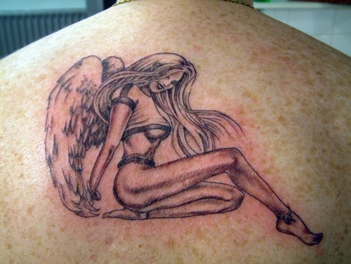 Naughty angel biker tattoo on back