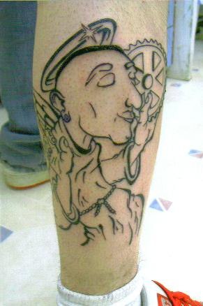Angel in chillout tattoo on leg