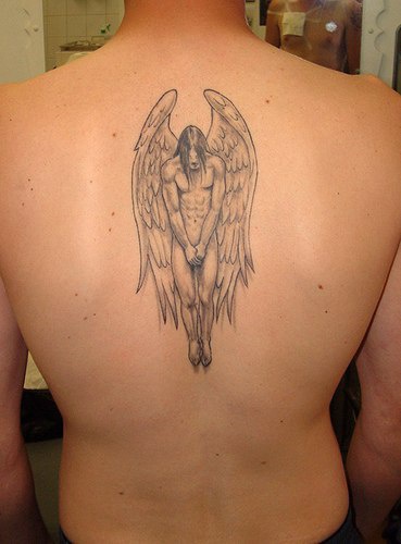 Naked male angel tattoo on man's back