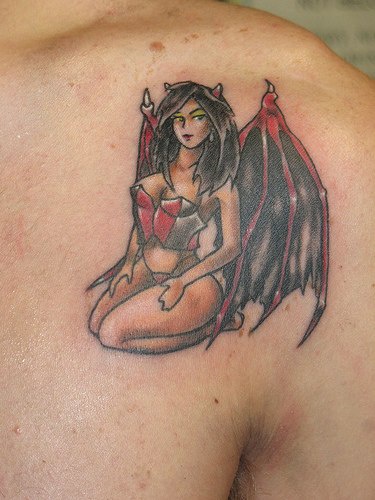 Devil girl with kinky look tattoo
