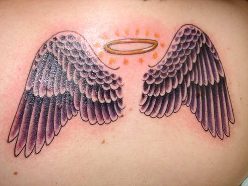 Angel wings and nimbus tattoo