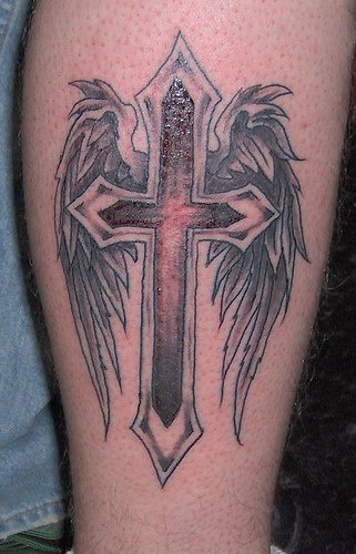Cross with angel wings tattoo