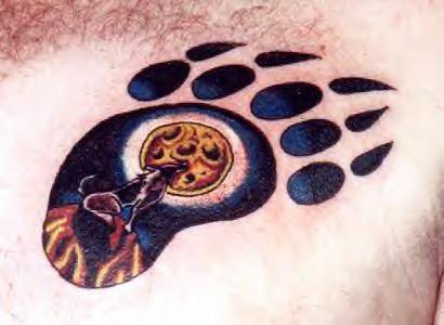 Bear pawprint with moon tattoo