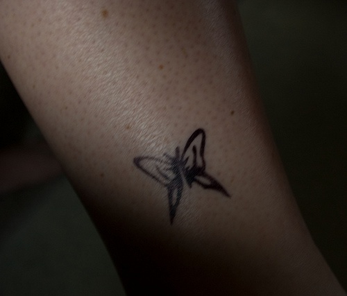 Little butterfly ankle tattoo
