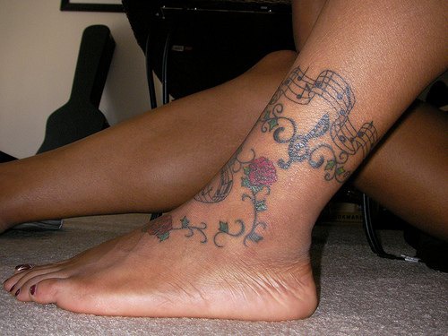 Flower melody ankle tattoo