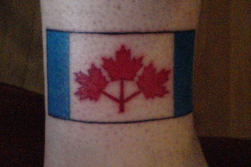 First Canadian flag ankle tattoo