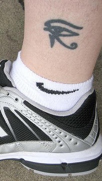 Gothic sign ankle tattoo