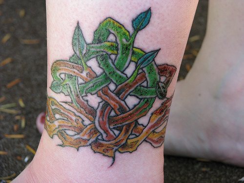 Confusion ankle tattoo