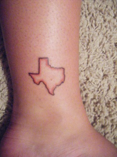 Contour de Texas le tatouage sur le mollet